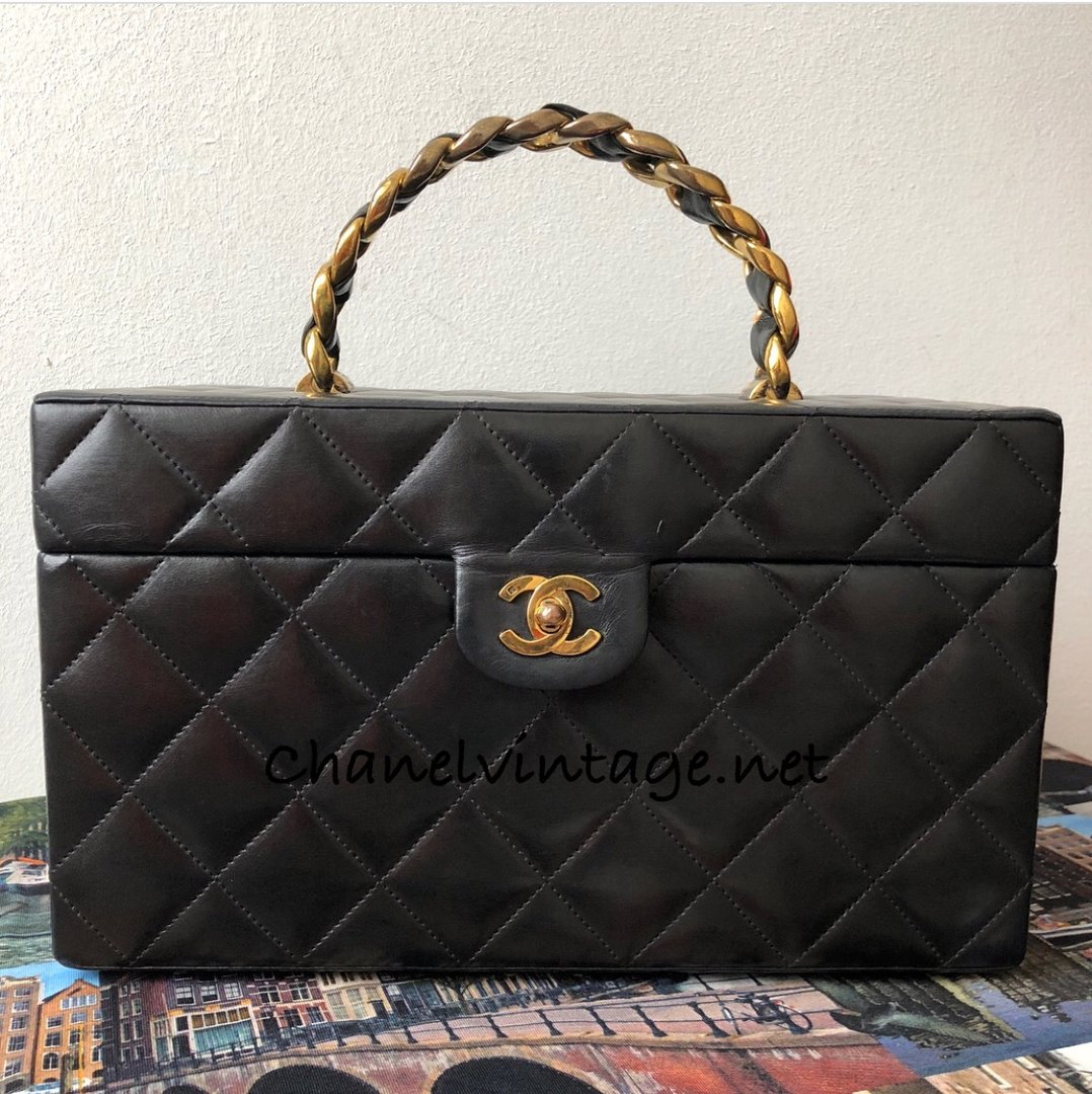 Chanel quilted vanity case with chain handle 